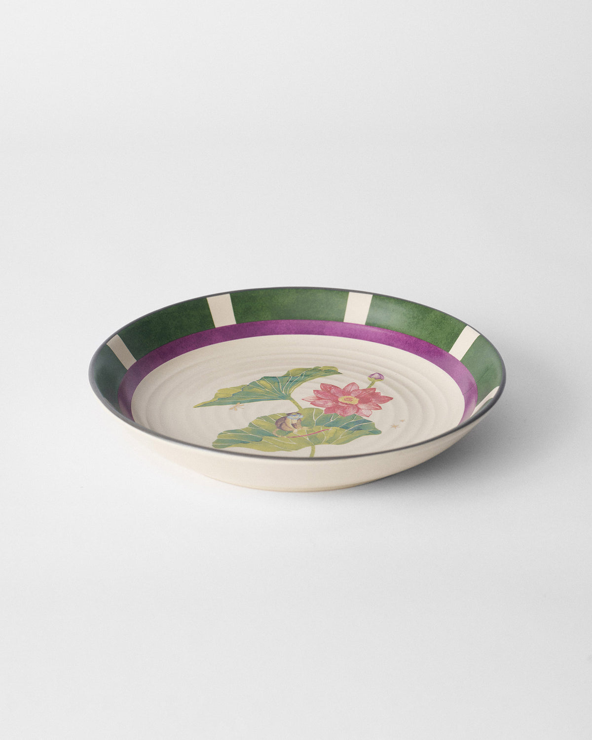 Lotus Garden pasta plate with pink lotus, lily pads, and green border.