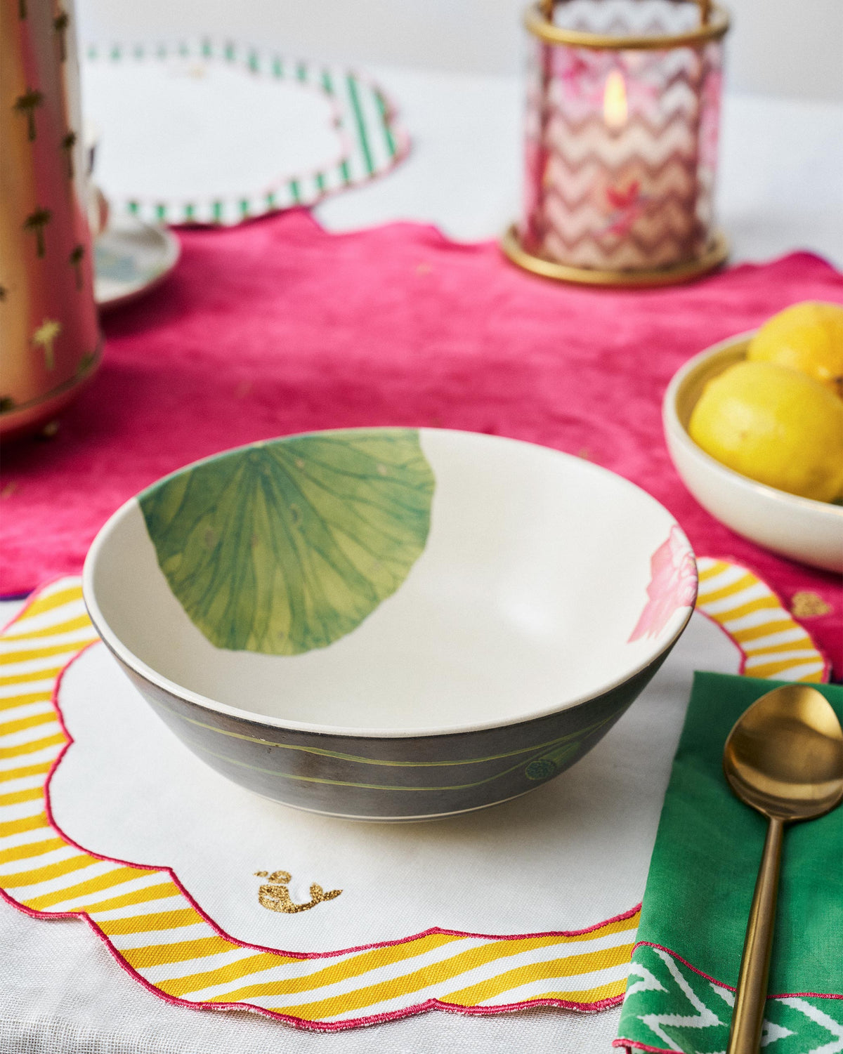 Lotus Garden curry bowl with lily pad motif set on a dining table.