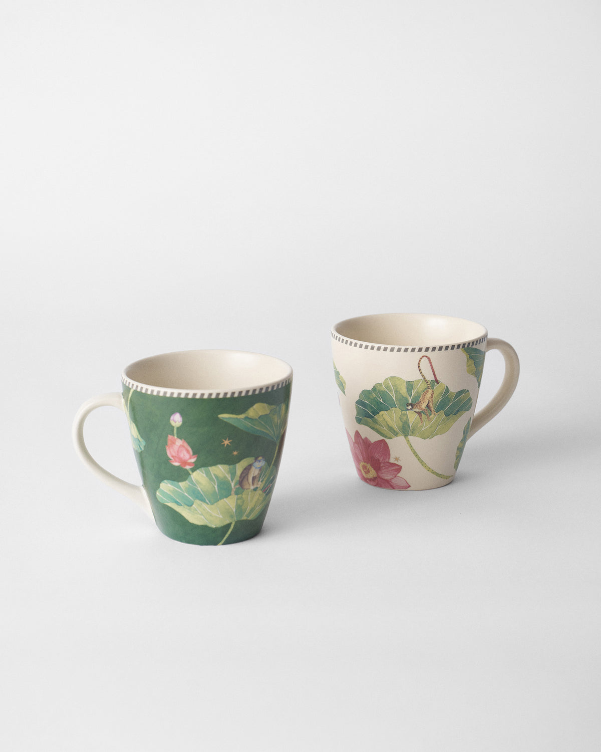 Pair of Float conical mugs with lotus leaves and monkeys.