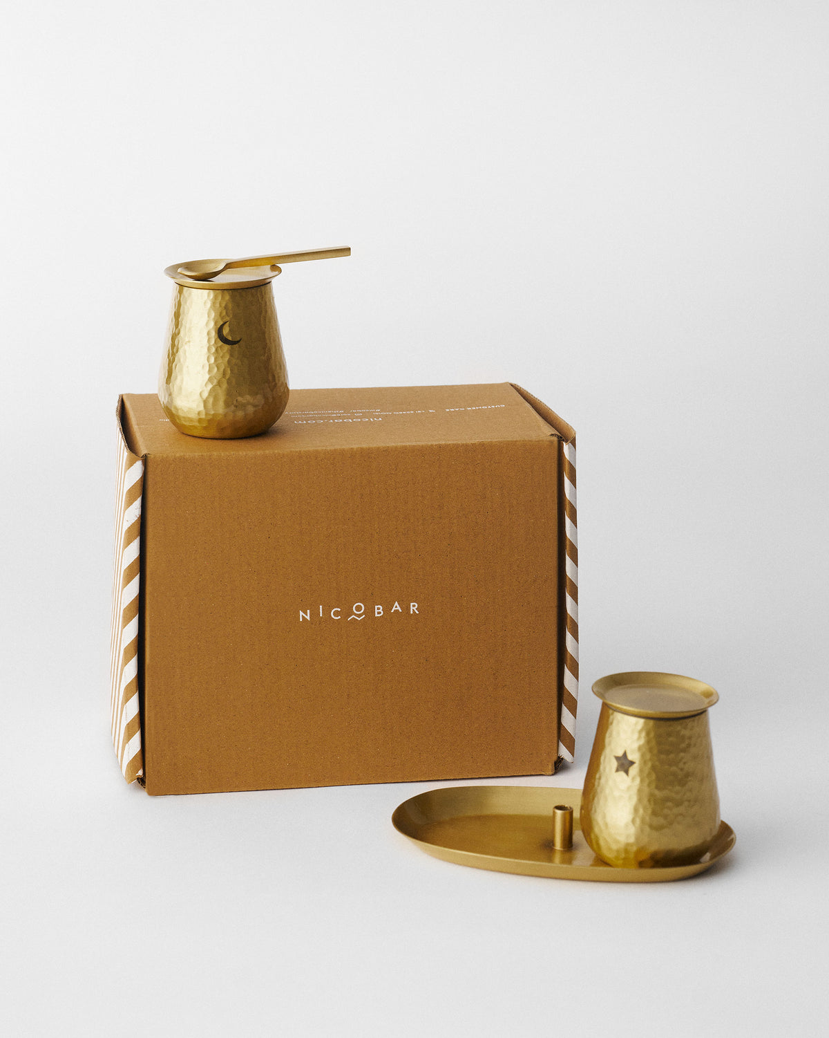 Chand Sitara salt and pepper set shown with its Nicobar gift box.