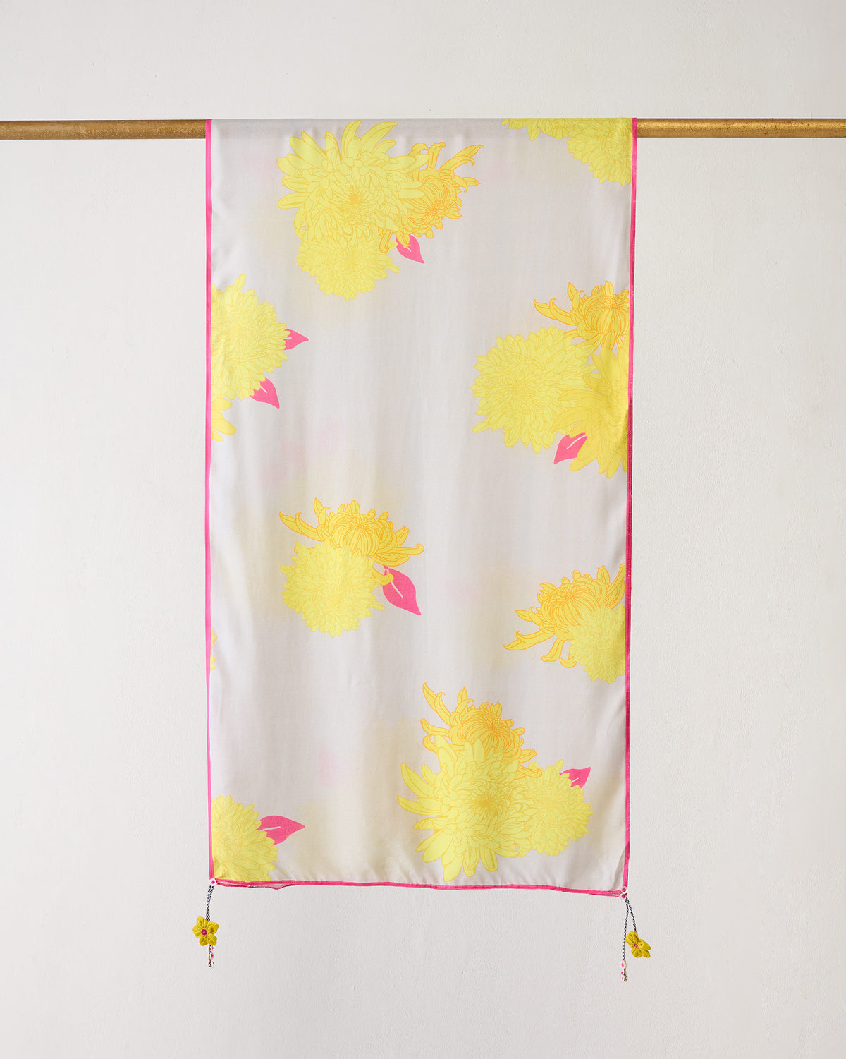 Floral Scarf hung flat, showing large yellow blooms and pink leaves on grey.