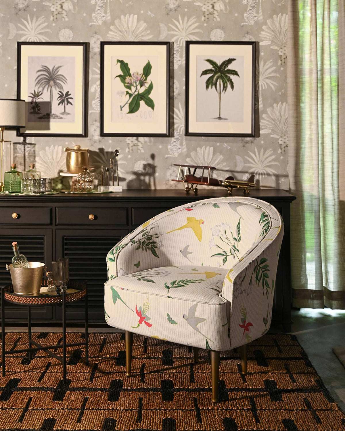 Canopy Chair with its bird print shown in a styled room.