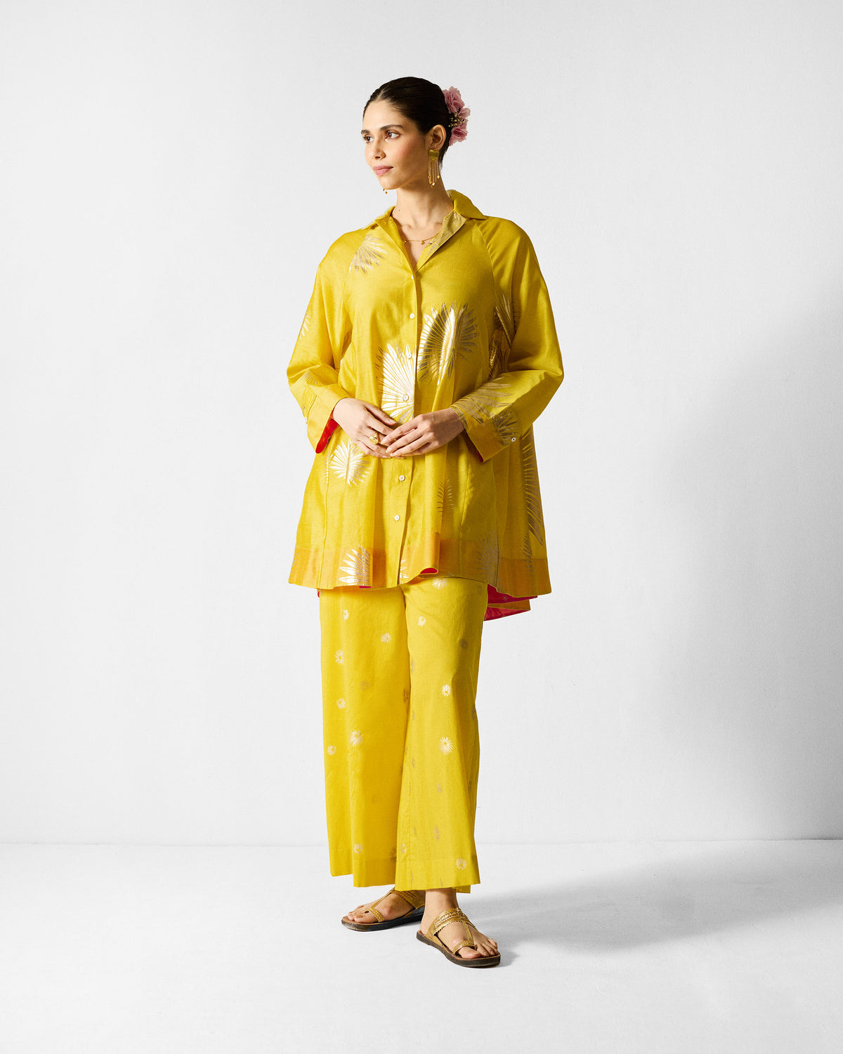 Chartreuse Flare Panelled Shirt with gold palm prints and pink lining at the hem.