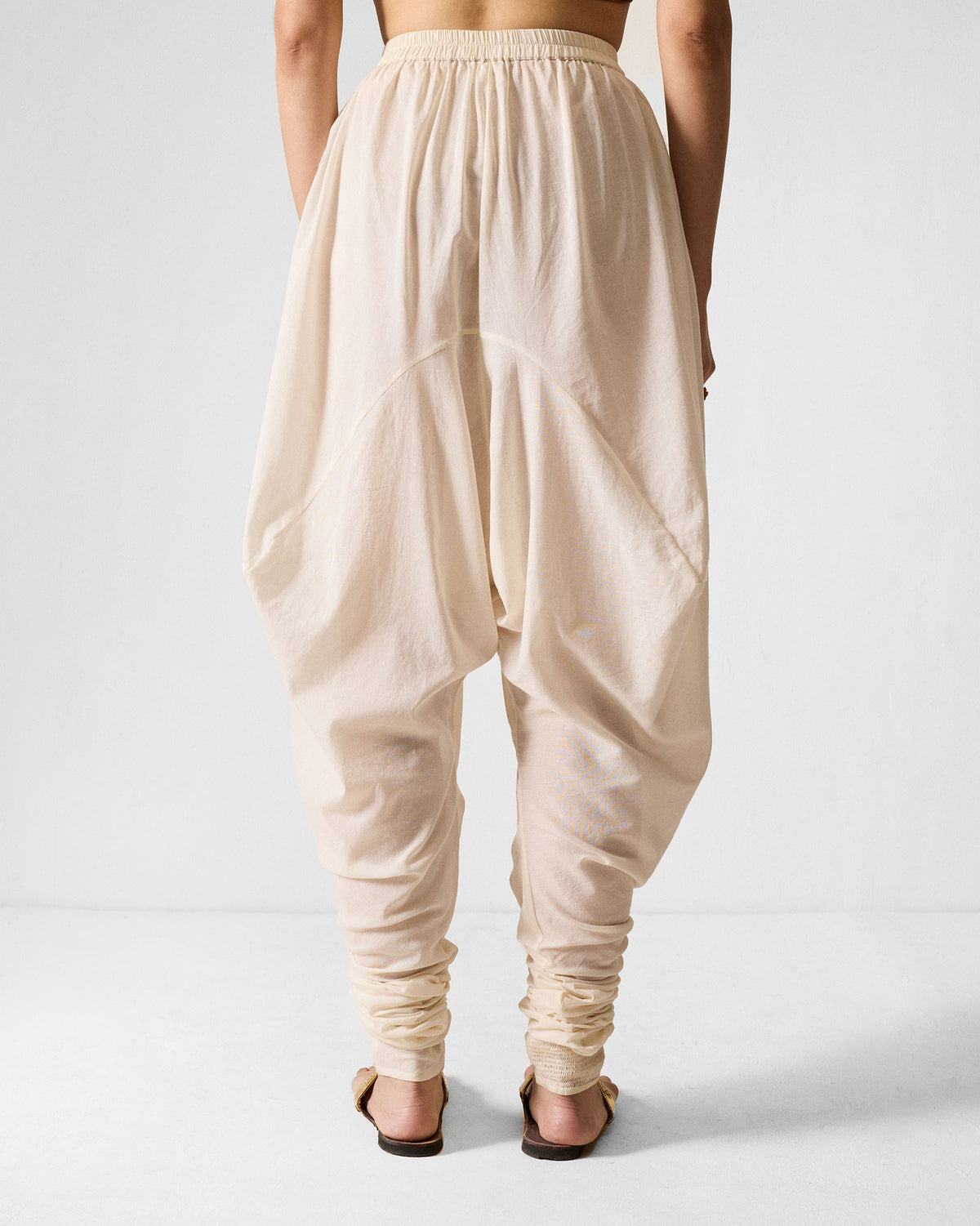 Back of ivory Jaisalmer Pants showing the draped seat and gathered ankles.