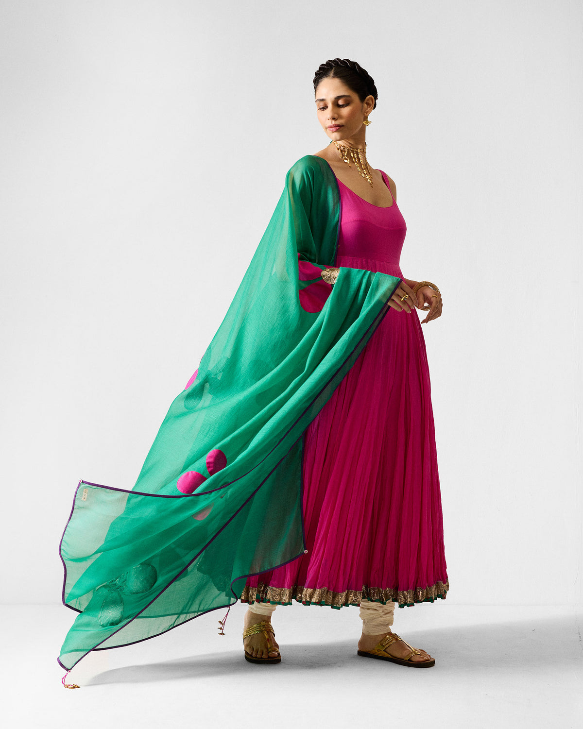 Ivory Jaisalmer Pants showing gathered churidar ankles under a longer hem.