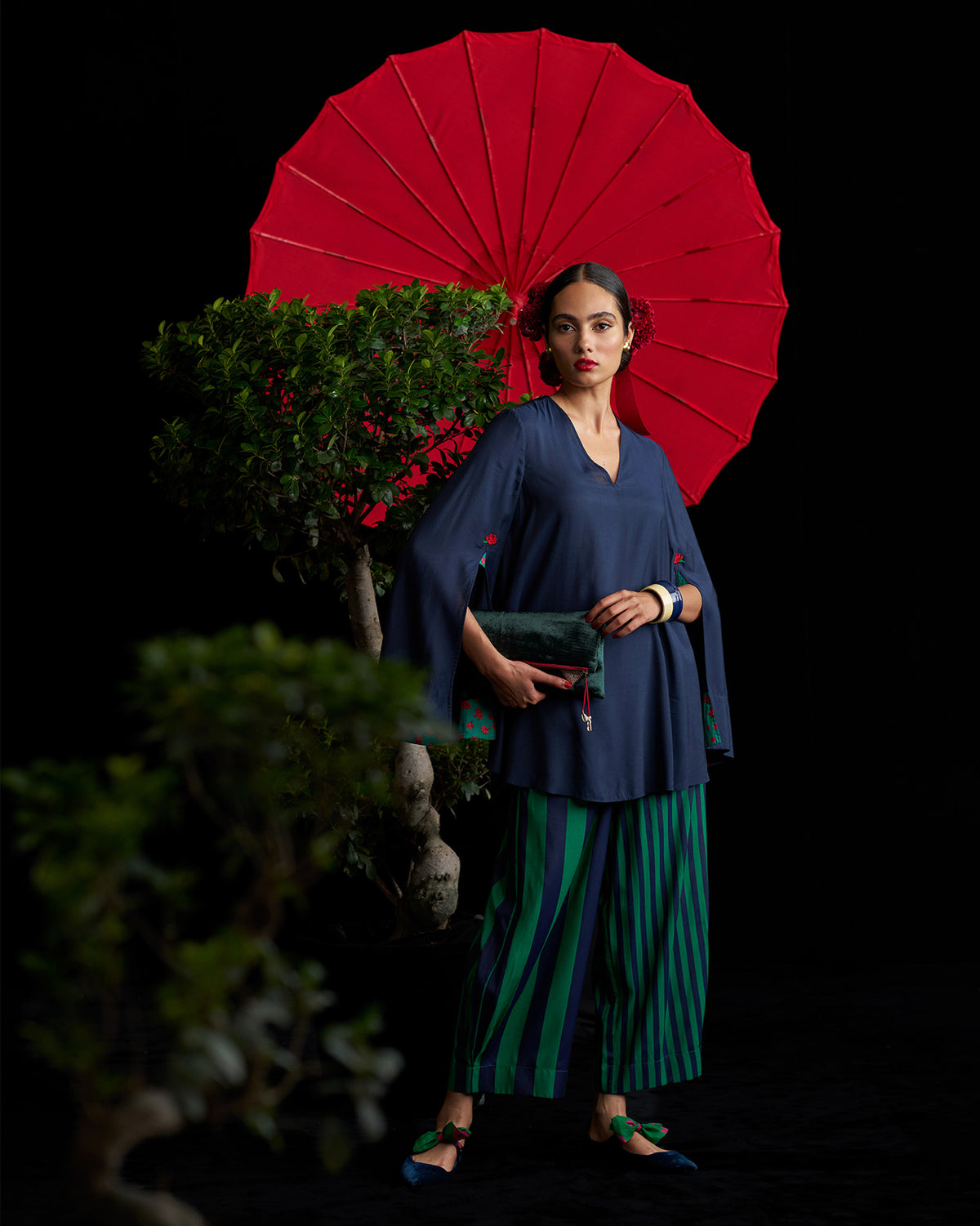 Person wearing a dark navy Panaji Top with split sleeves.