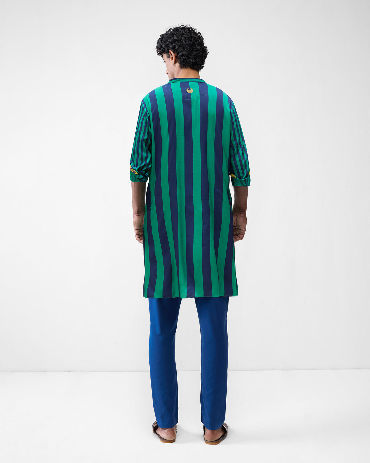 Back of a green and navy striped Gala Kurta with a gold motif below the collar.