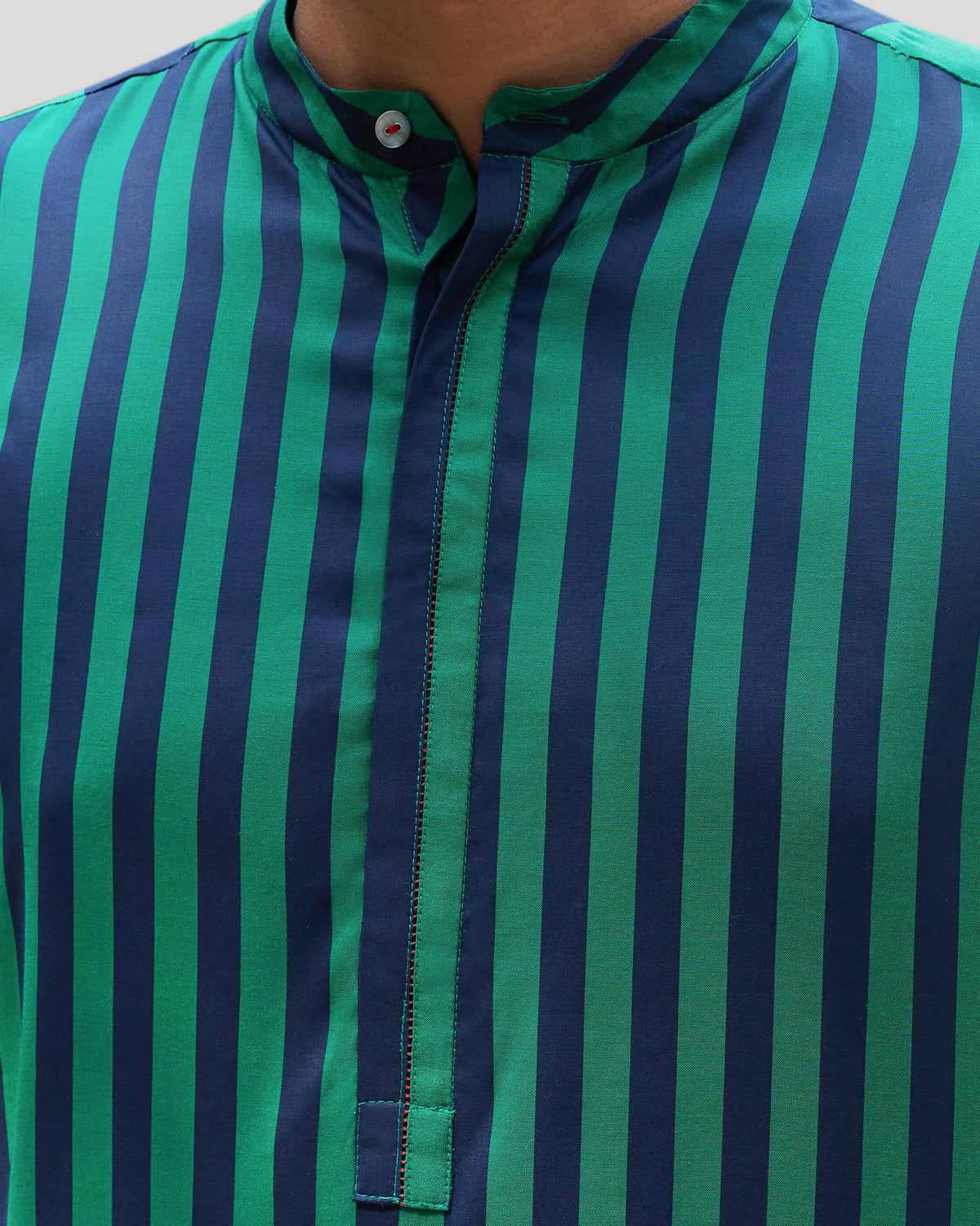 Close-up of a Gala Kurta band collar and ladder-stitched placket on green and navy stripes.