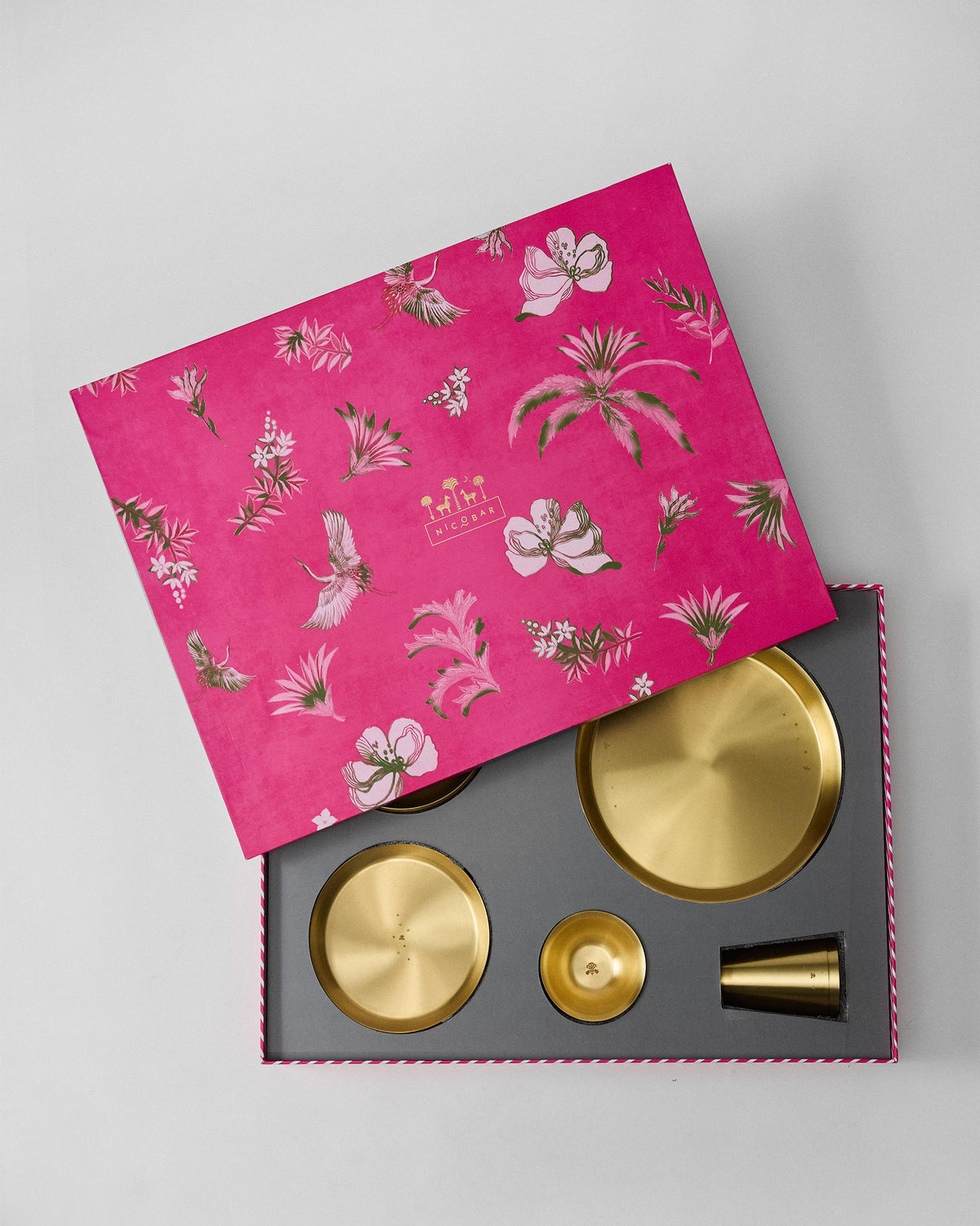 Madhu Dinner Gift Set in its box, with the pink floral lid tilted open.