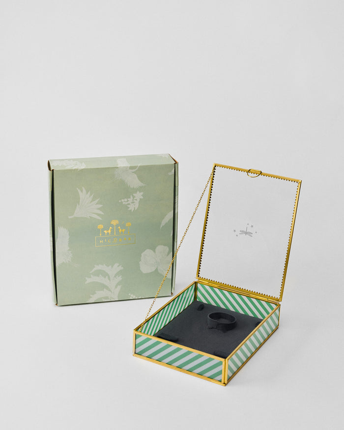 Open Trove jewellery box with glass lid beside its Nicobar gift box.