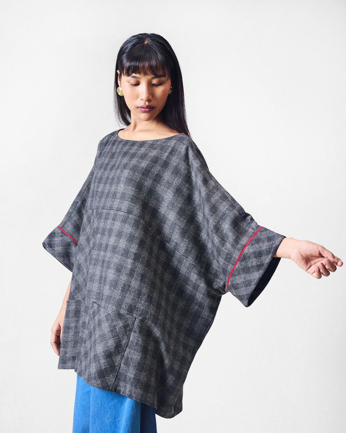 Fable Top front in black and charcoal check with a wide boat neck.