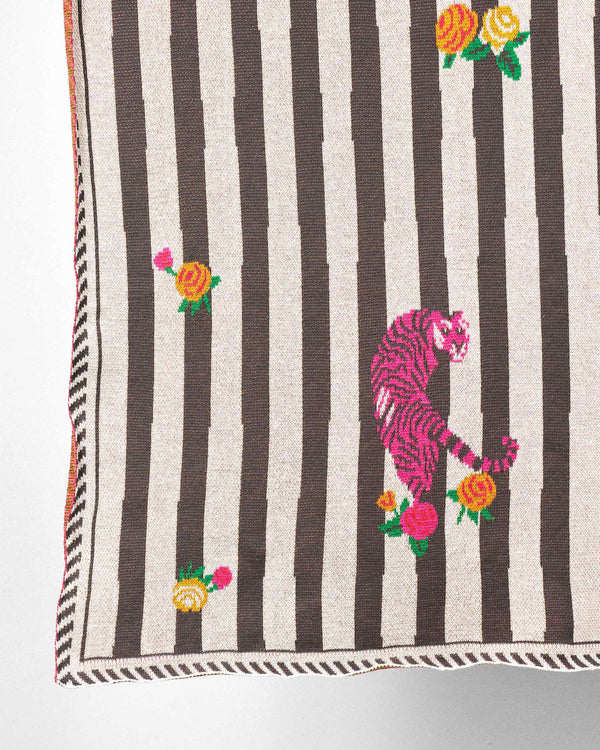 Close view of the pink tiger among roses