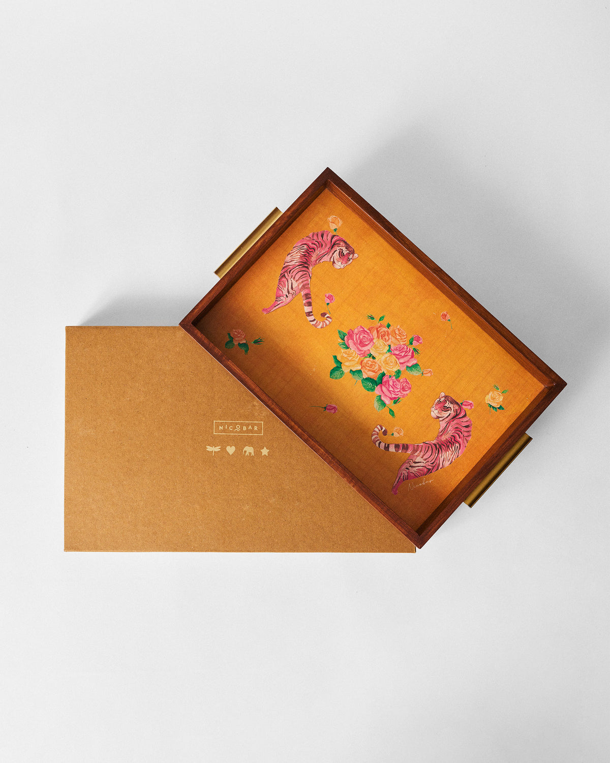 Myra tray resting on its brown Nicobar gift box with the logo visible.