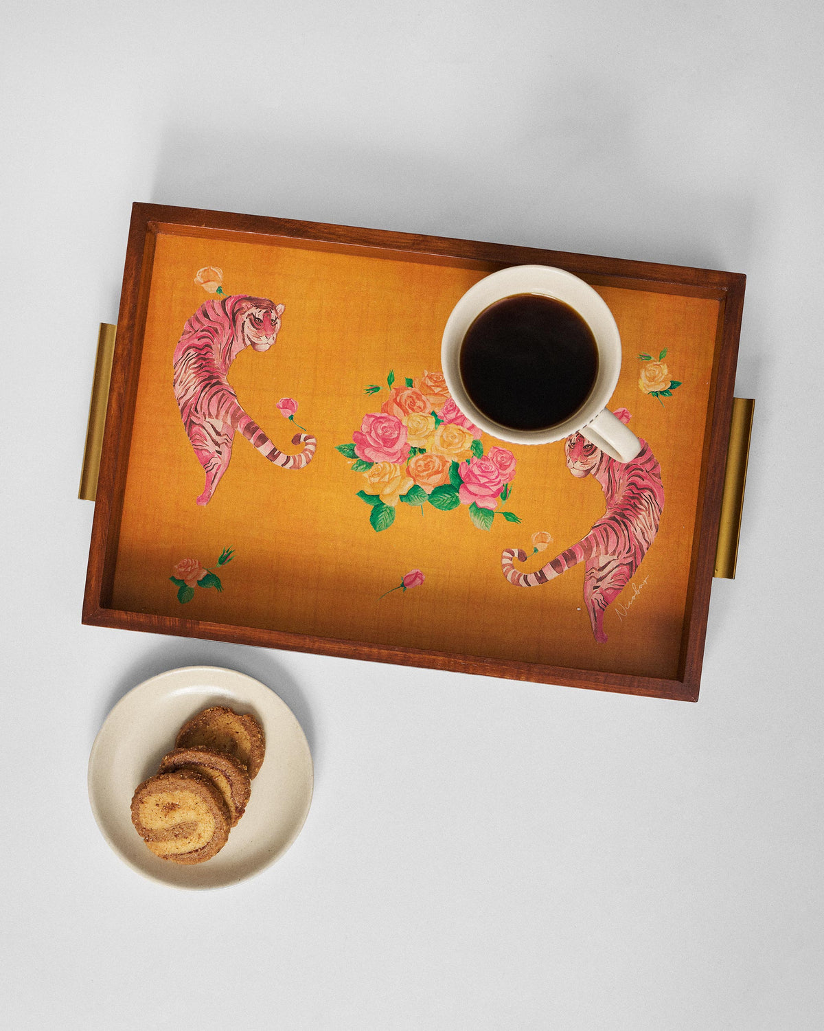 Myra tray set with a mug and cookies, showing the pink tiger and rose print.