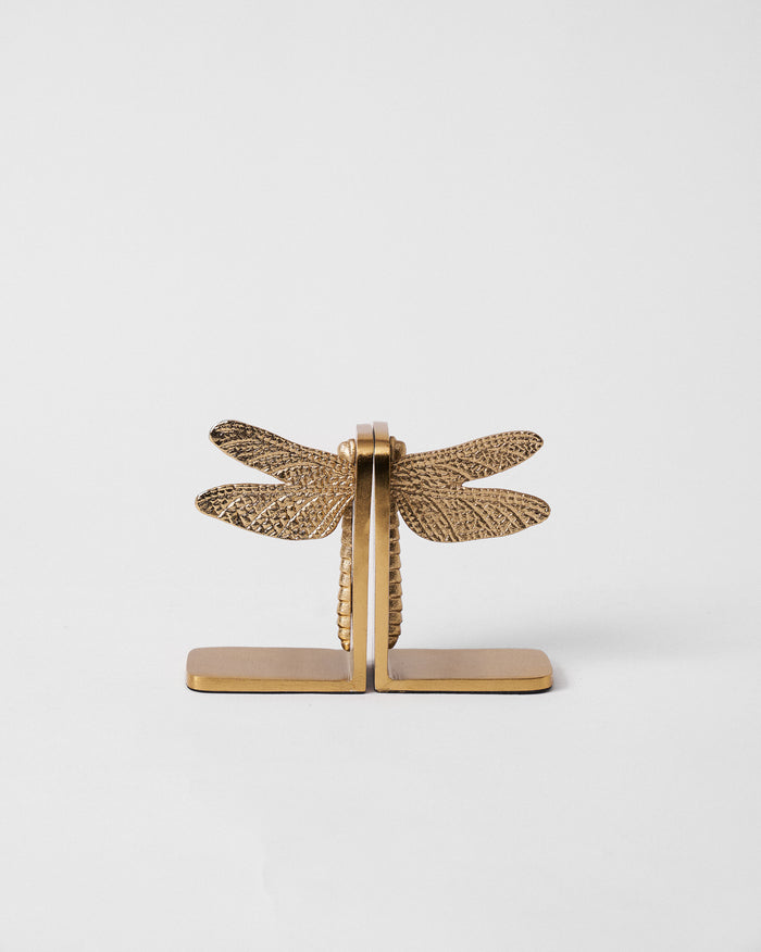 The two bookends joined into one full dragonfly