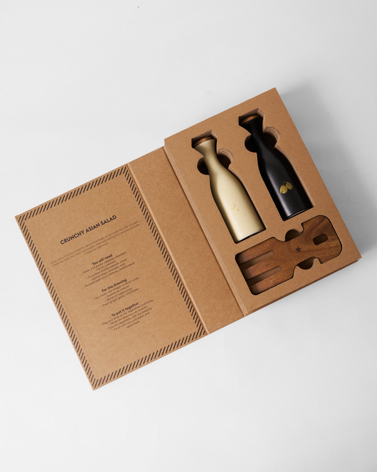 Chand Ambi Oil Pourer & Servers Set in an open kraft gift box.