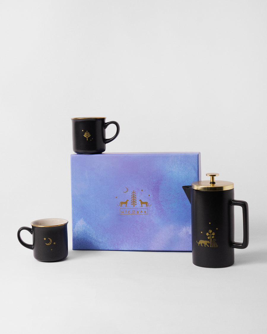 The press and mugs around the lavender gift box