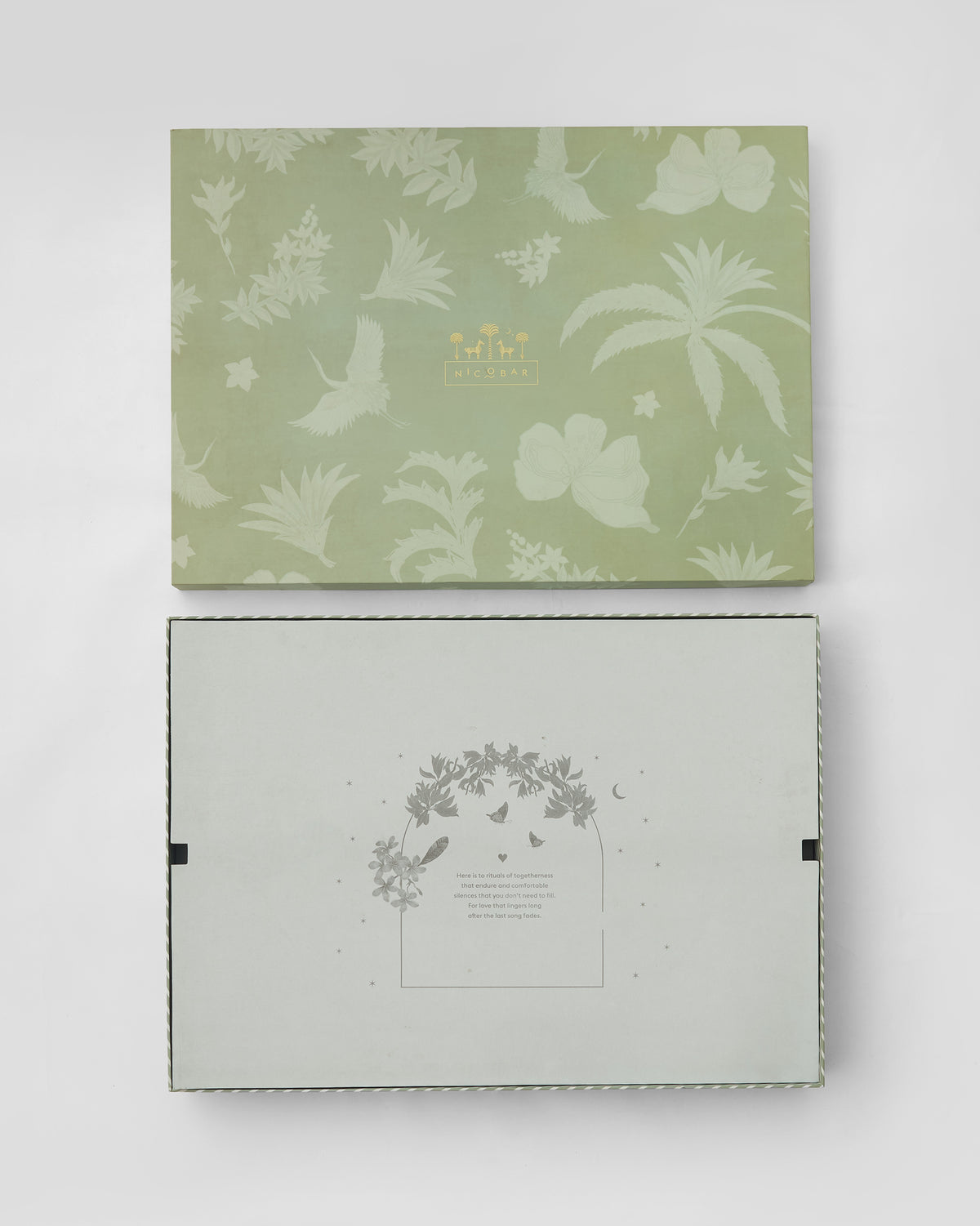 Open Botanical Barware gift box showing the illustrated insert.