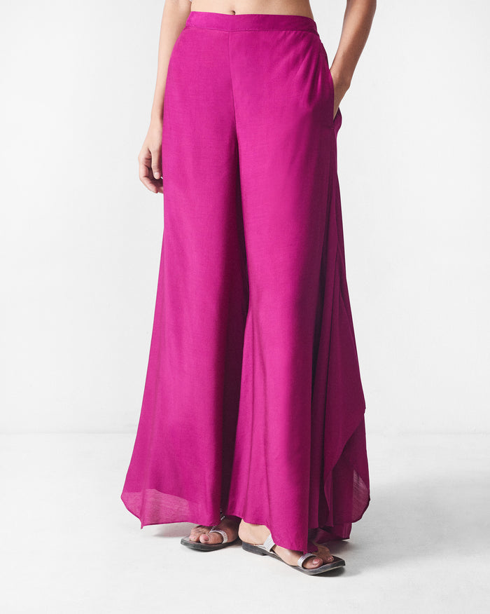 Mulberry Uneven Hem pants with a wide flared silhouette.