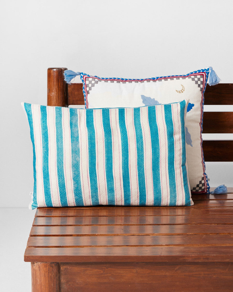 The cushion's striped reverse.