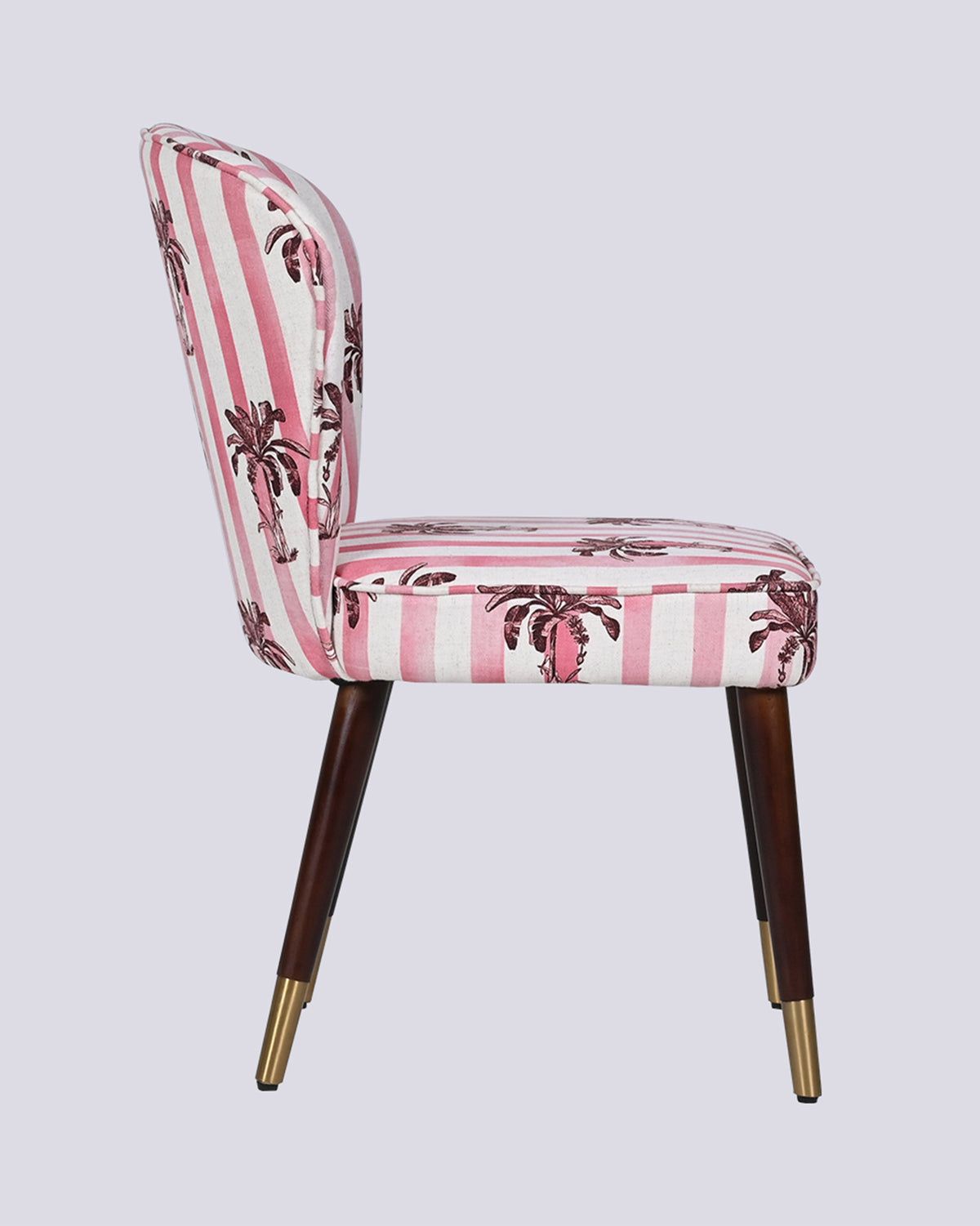 Side view of a Ripple chair showing its curved back and gold-tipped wood legs.