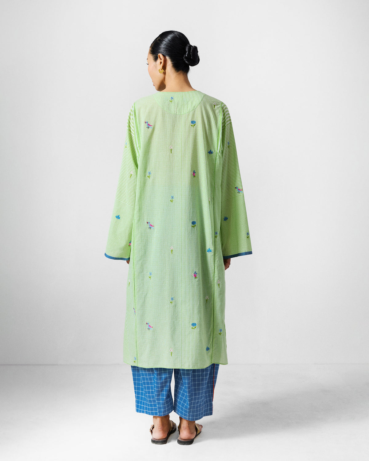 Back of a green and white embroidered Gigi Kurta.