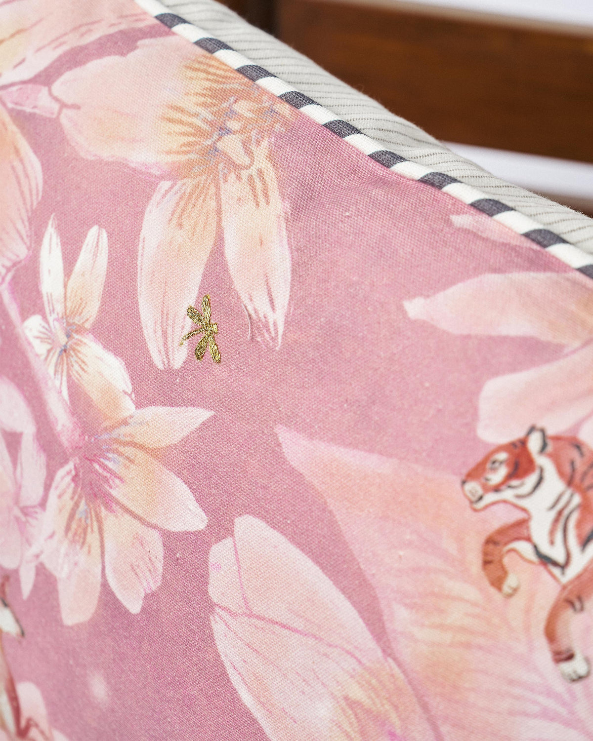 Close-up of the Stag Cushion Cover showing a tiger motif in the pink print.