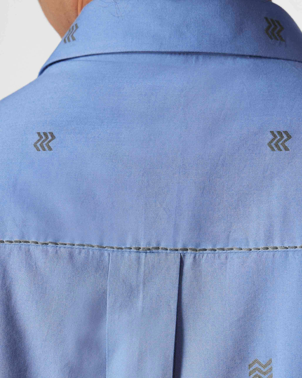 Close-up of the back yoke stitching on a blue Sindhu Shirt.