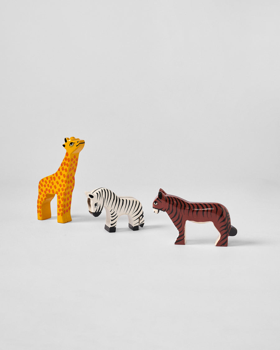 The three animals standing apart