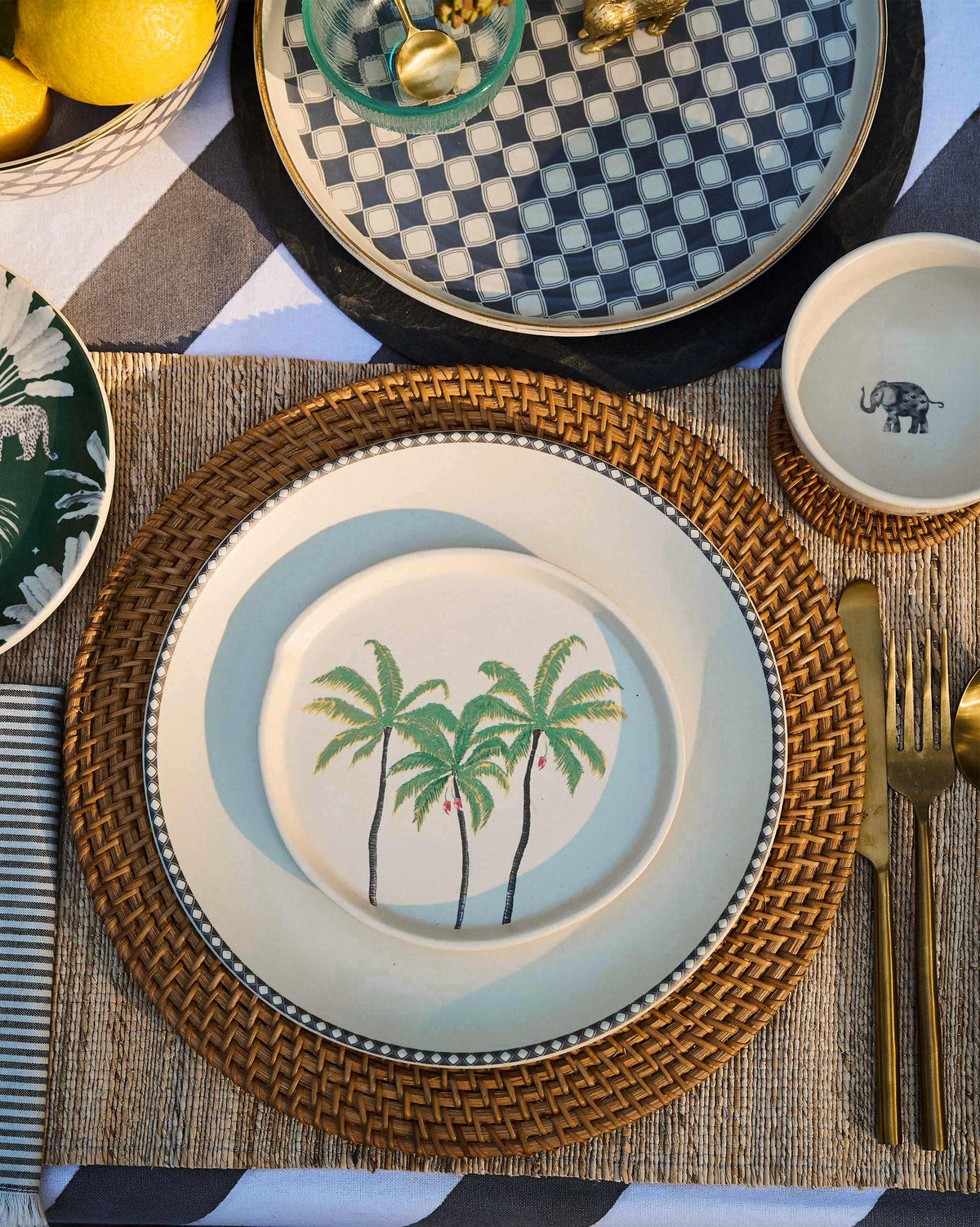 The Kandy Dessert Plate on a rattan charger.