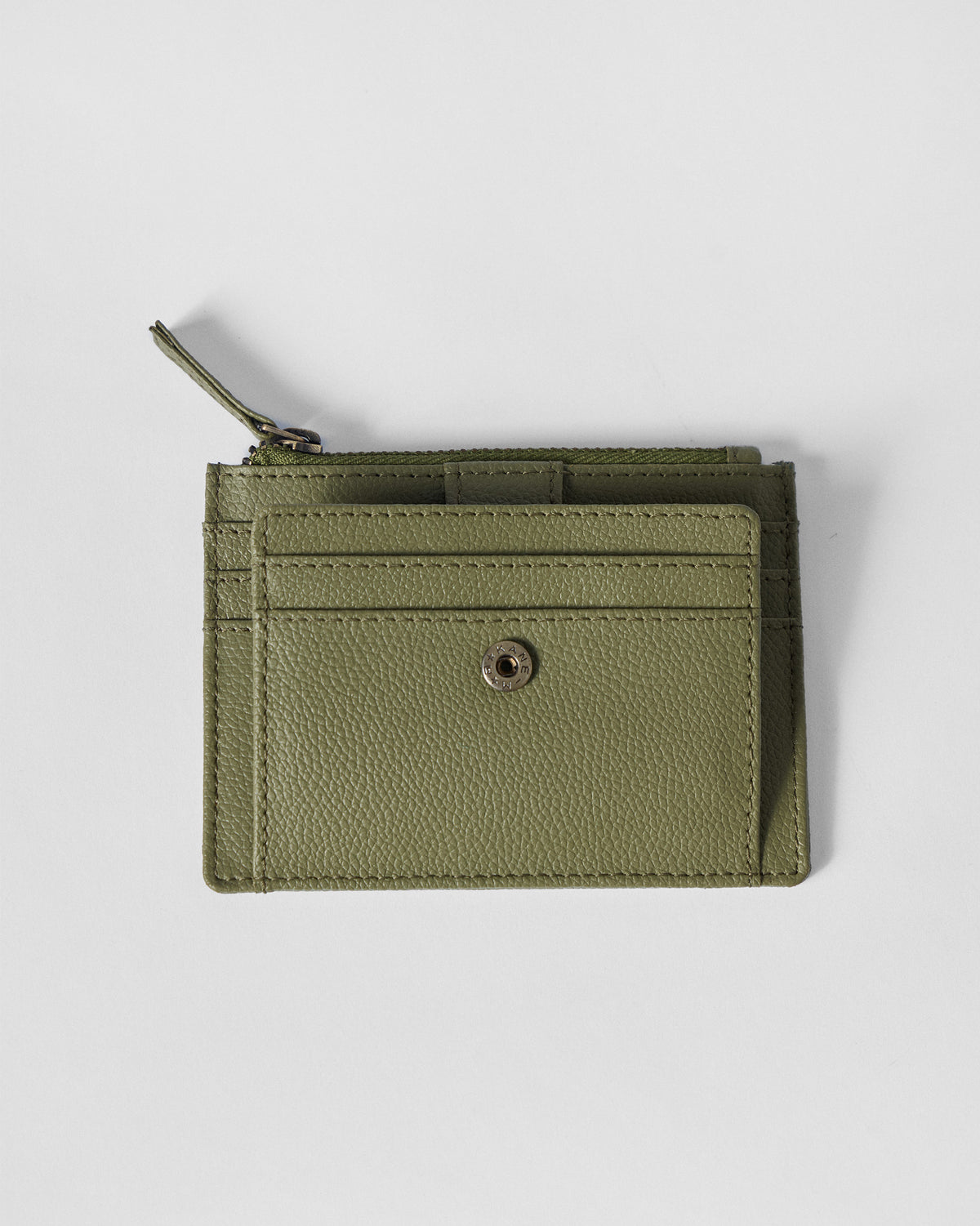 Green Everyday Star card holder showing three front card slots and a snap.