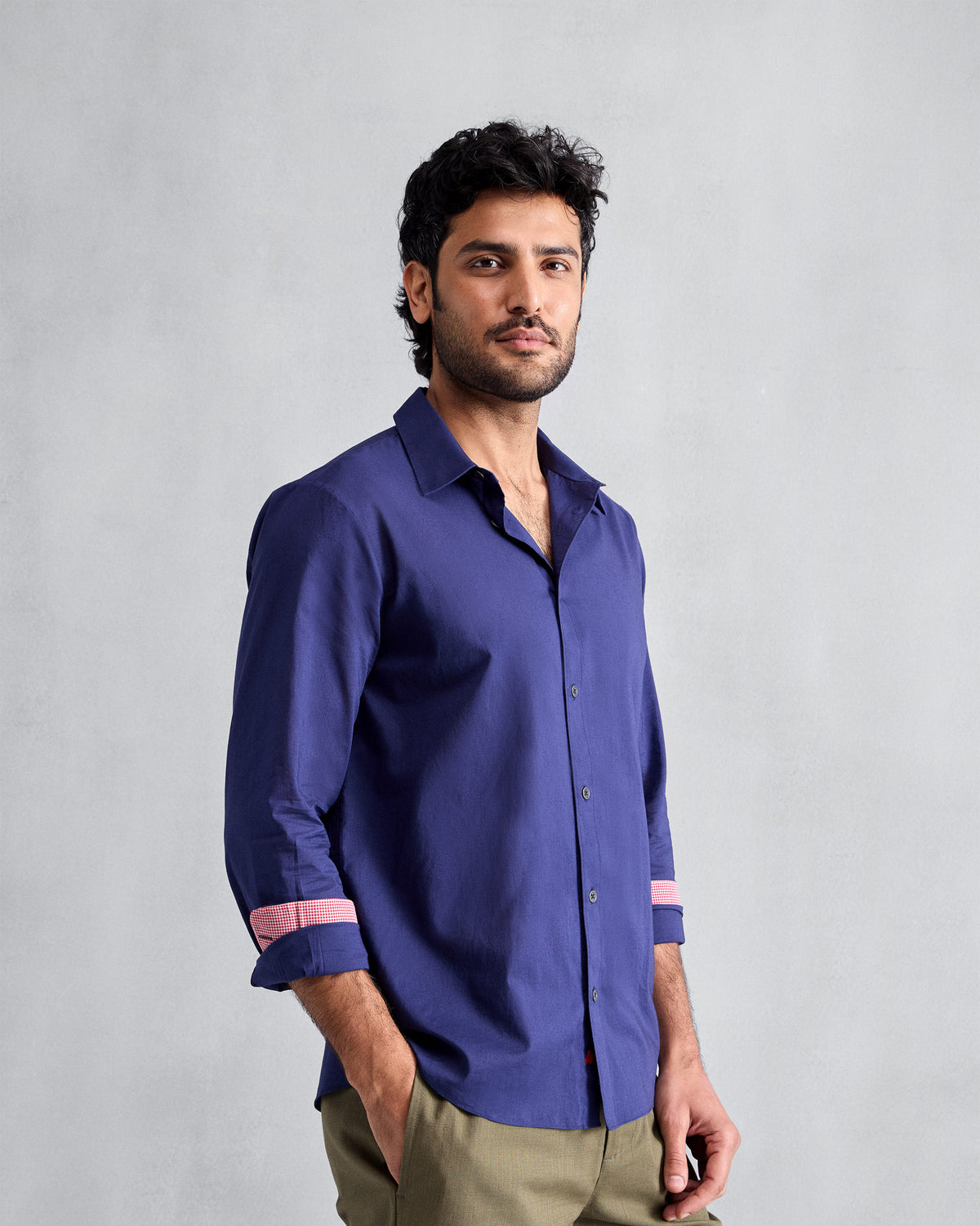 Person wearing an ink blue Classic shirt.