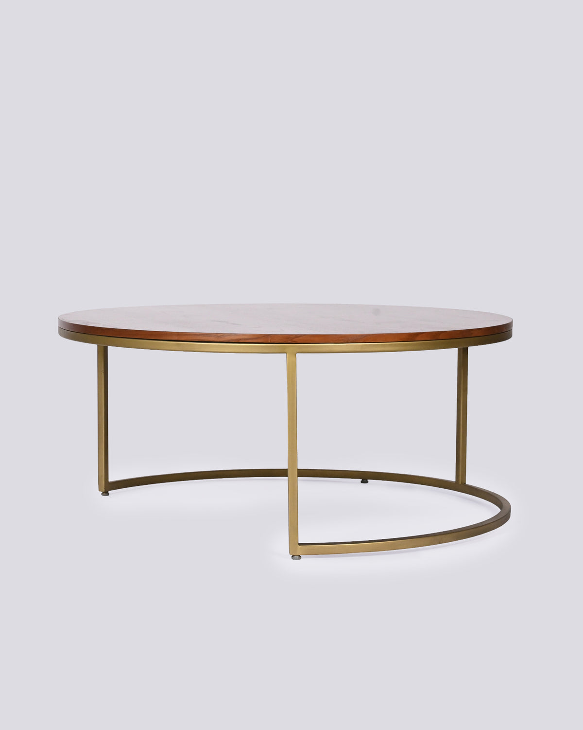 Round Orbit center table with a wood top and open brass C-shaped base.