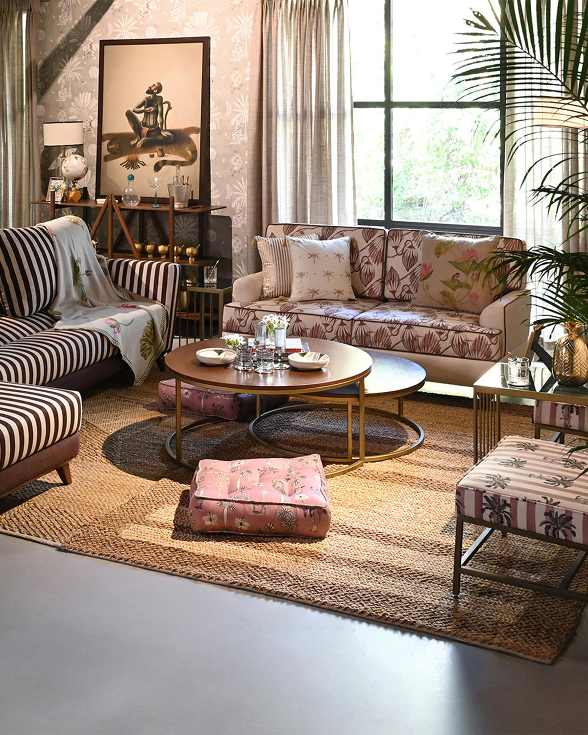 Orbit nesting center tables as the centerpiece of a patterned living room.