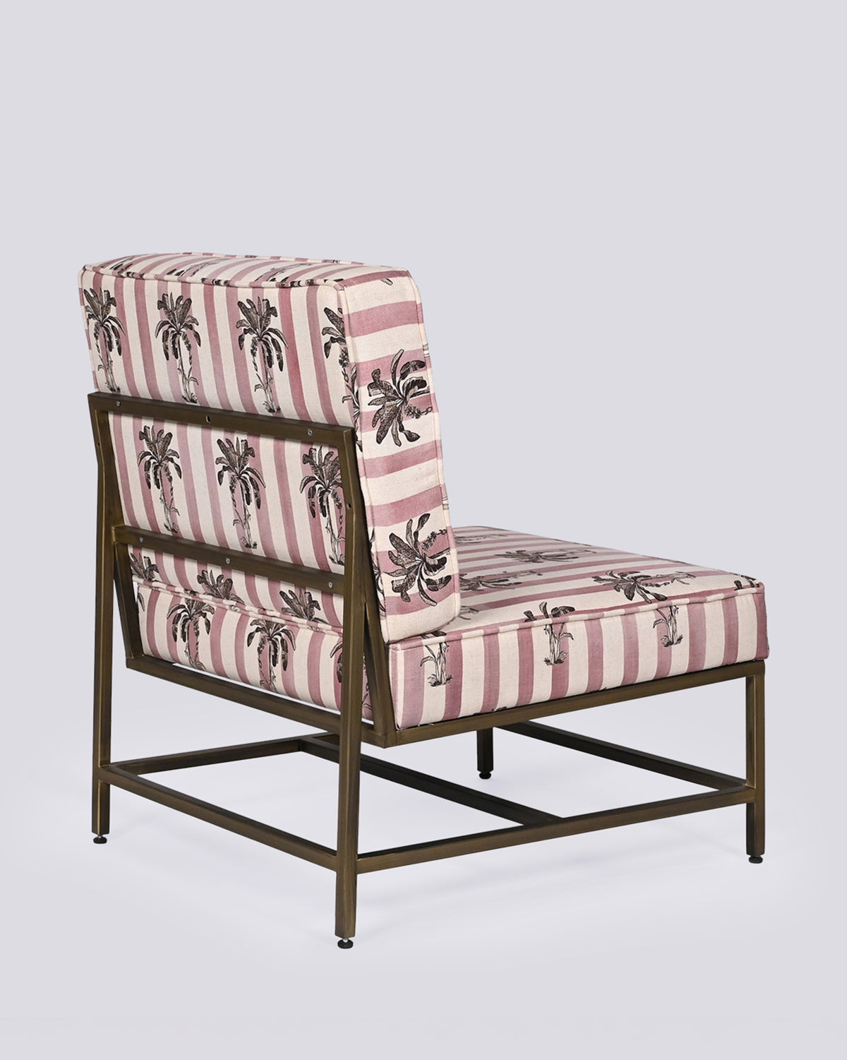 Back of the Bay Chair showing the brass metal frame and striped palm cushions.