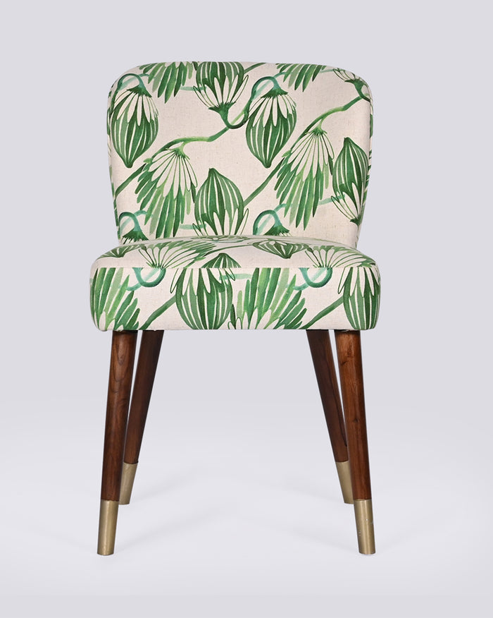 Breeze Dining Chair in green blooms print with dark wood legs.