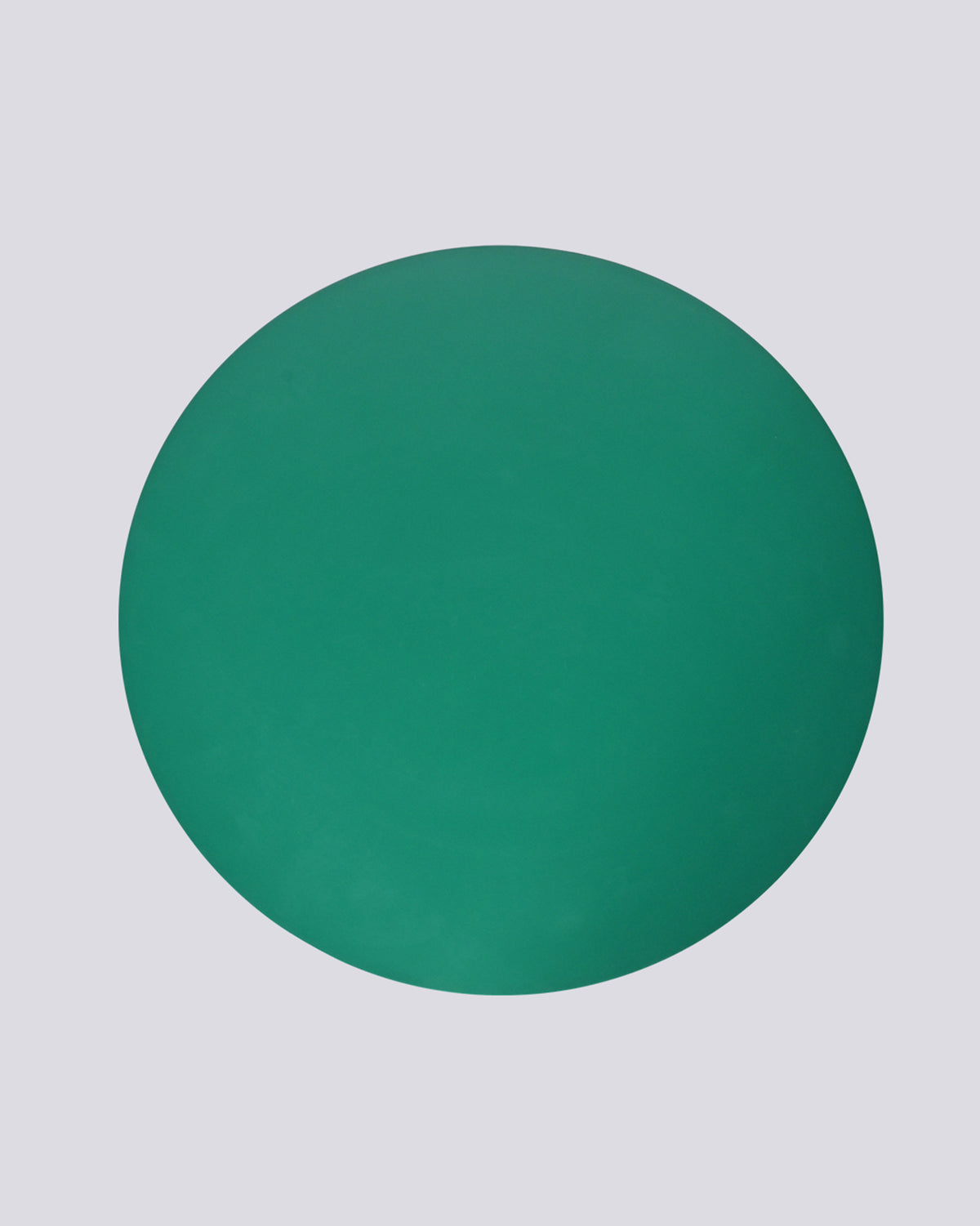 Overhead view of the round green top of the Fern Side Table.