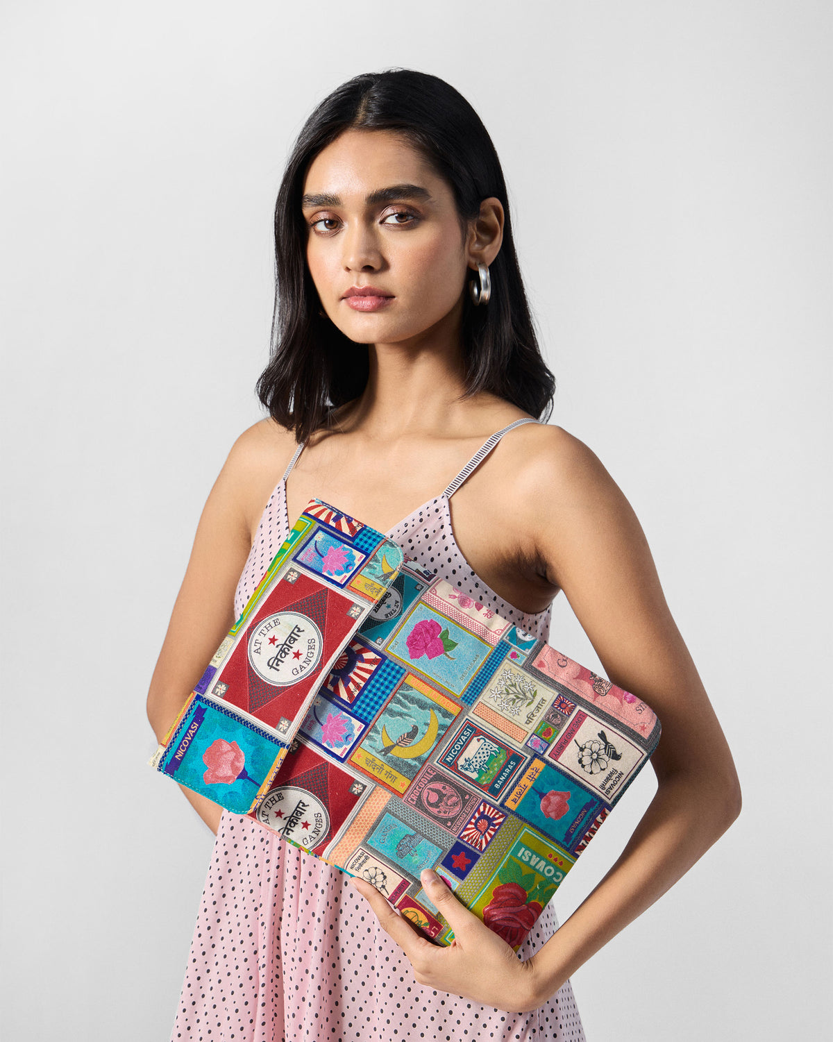 Multicolor Matchbox Laptop Sleeve with a matchbox art print.