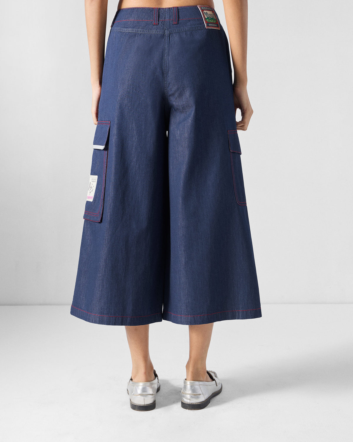 Back of blue Ella culottes with red contrast stitching and a wide cropped leg.