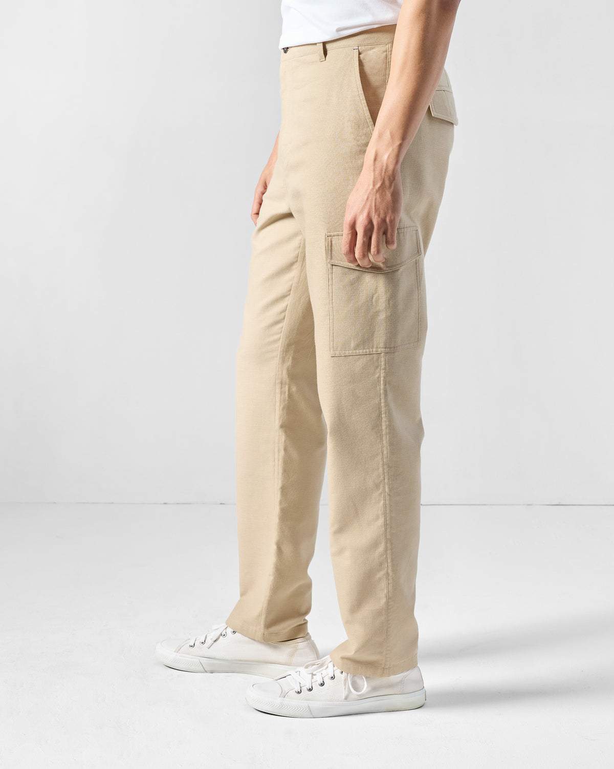 Side view of natural Riverbank pants showing the cargo pocket.