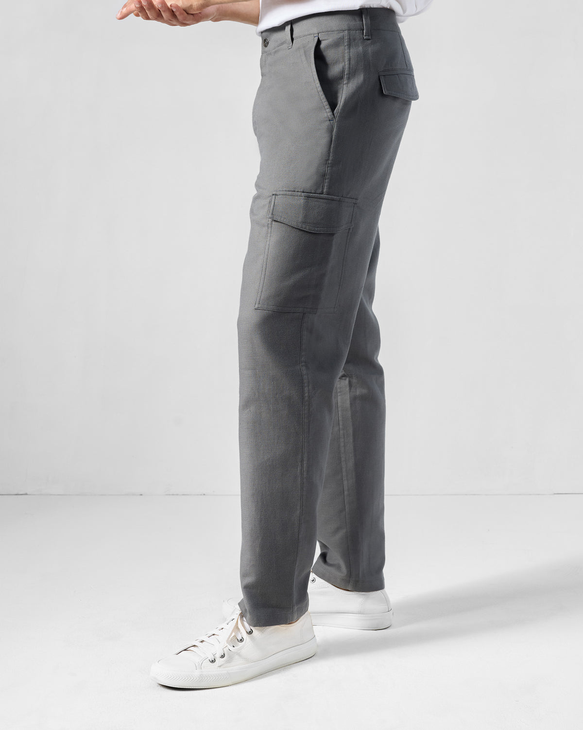 Side view of charcoal Riverbank pants showing the cargo pocket.