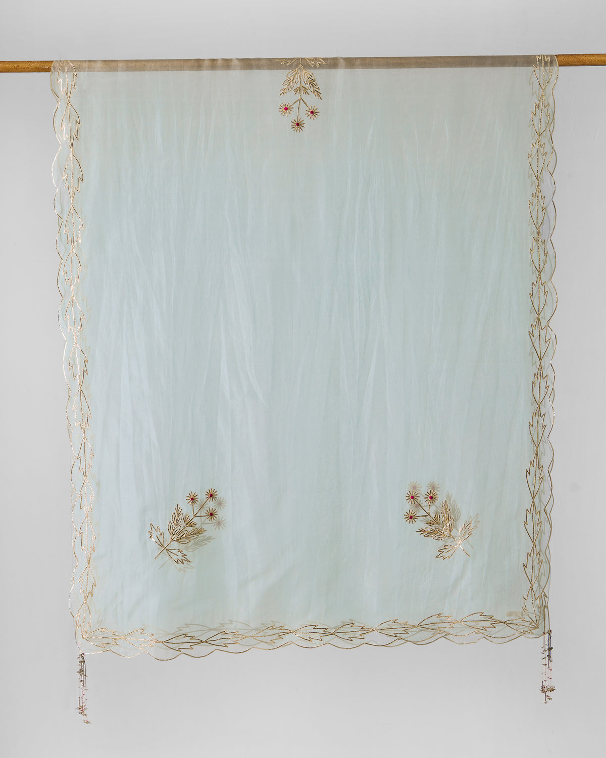 Powder blue Kasara Dupatta with gold gota embroidery and corner tassels.