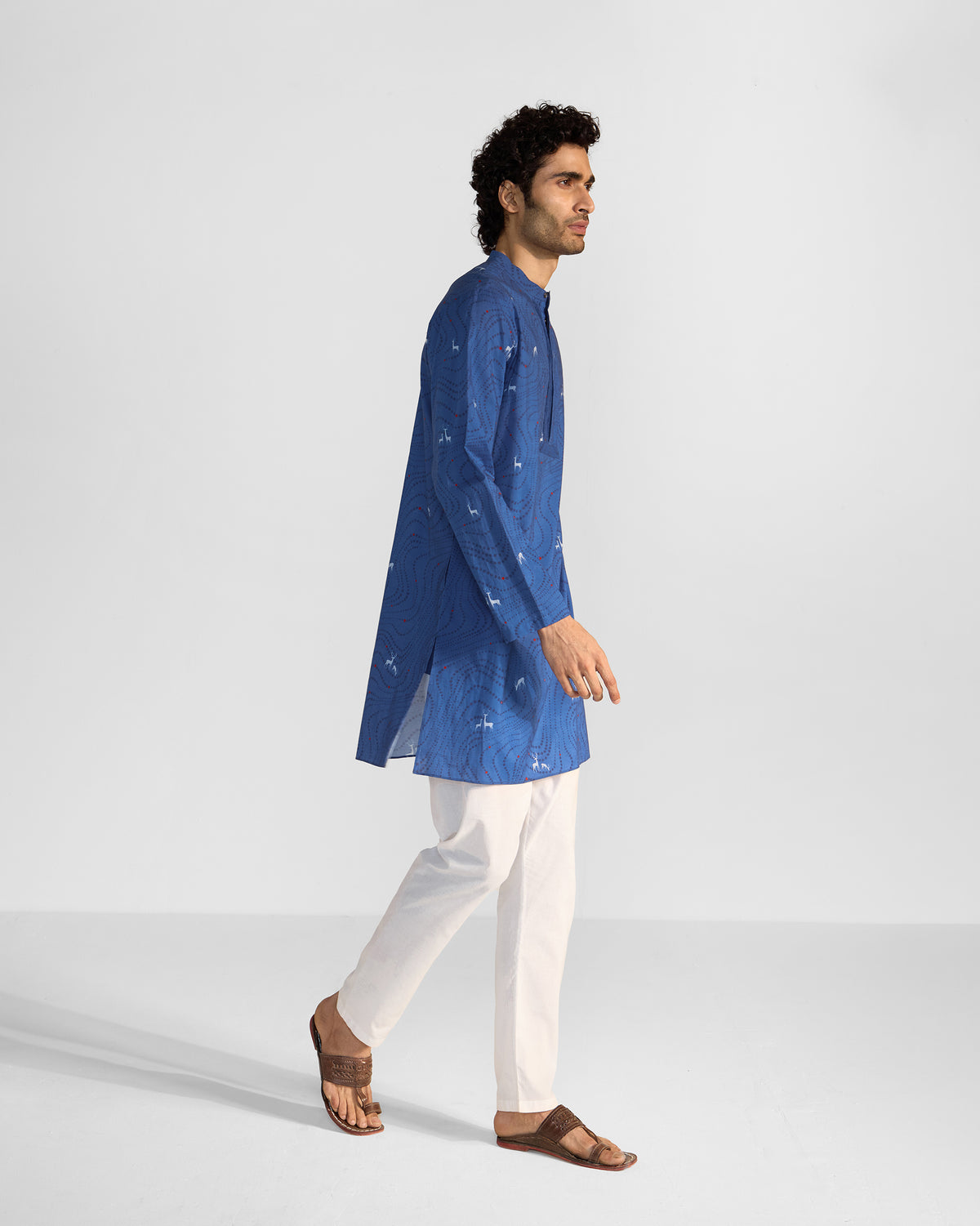 Side view of a blue Front Pleat kurta with deer print.