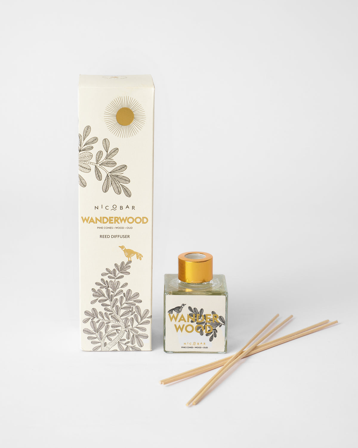 Wanderwood reed diffuser with cream box, bottle, and wooden reeds.