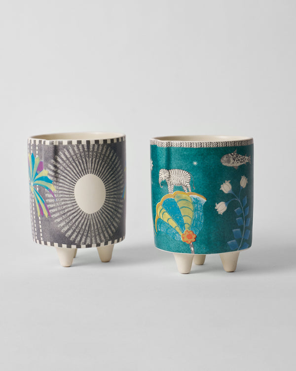 Both planters on their small feet