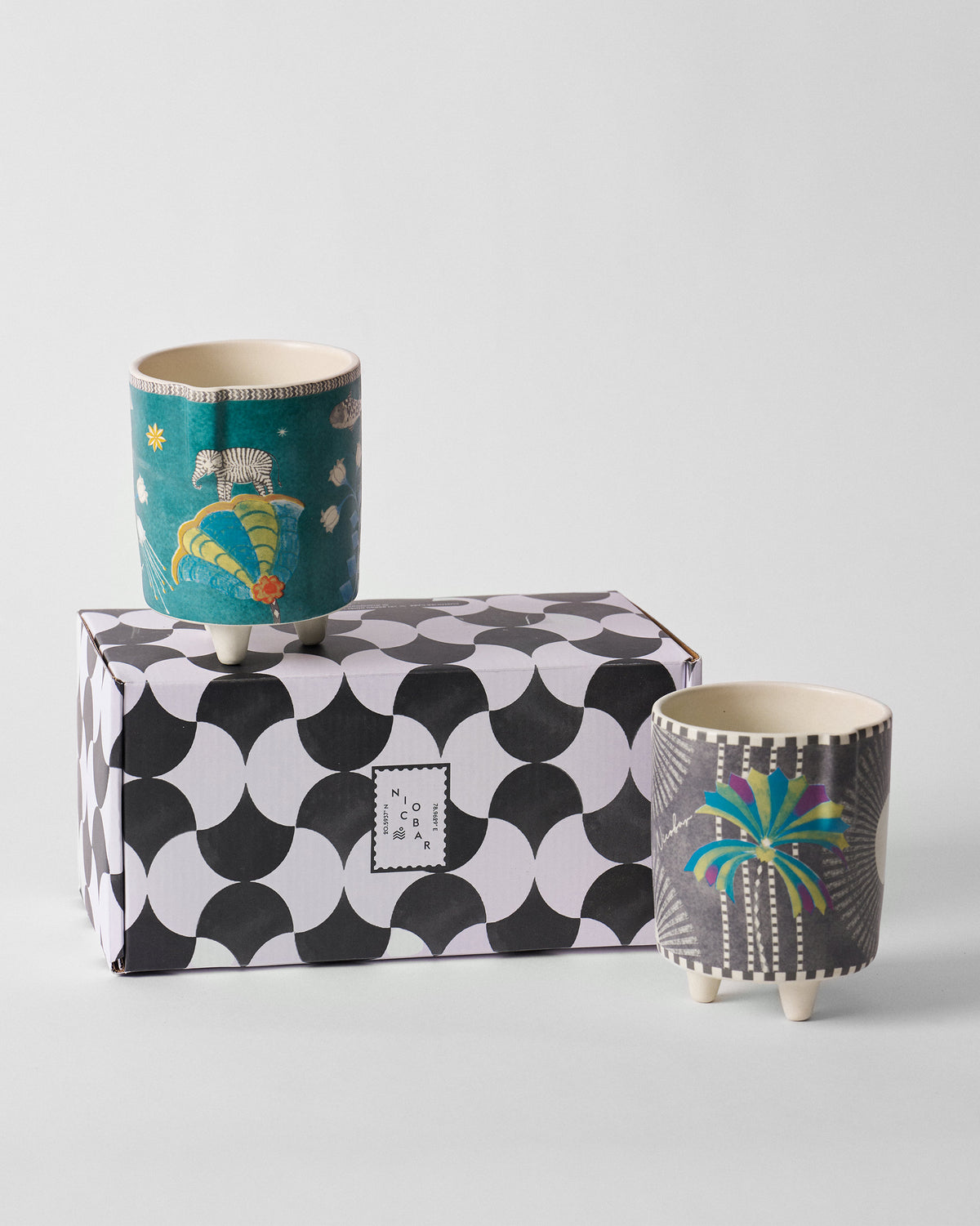 Palm Bloom planters with a scalloped Nicobar gift box.