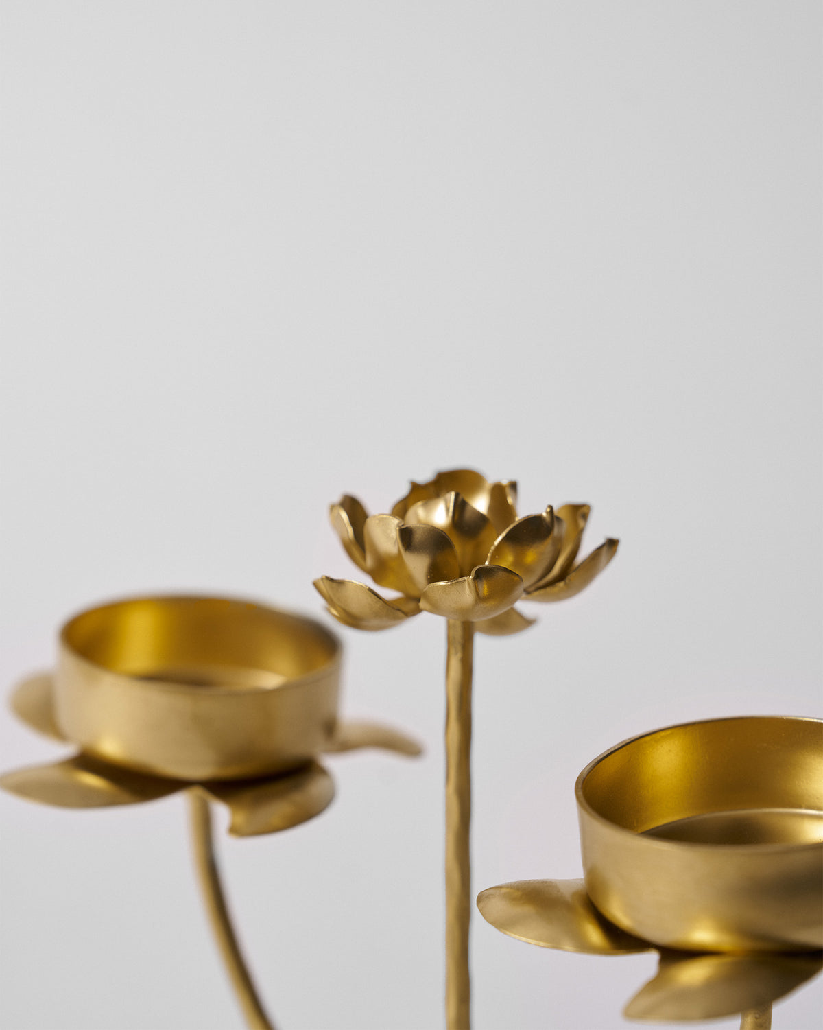 Close-up of Mogra bud tealight cups and central blossom.