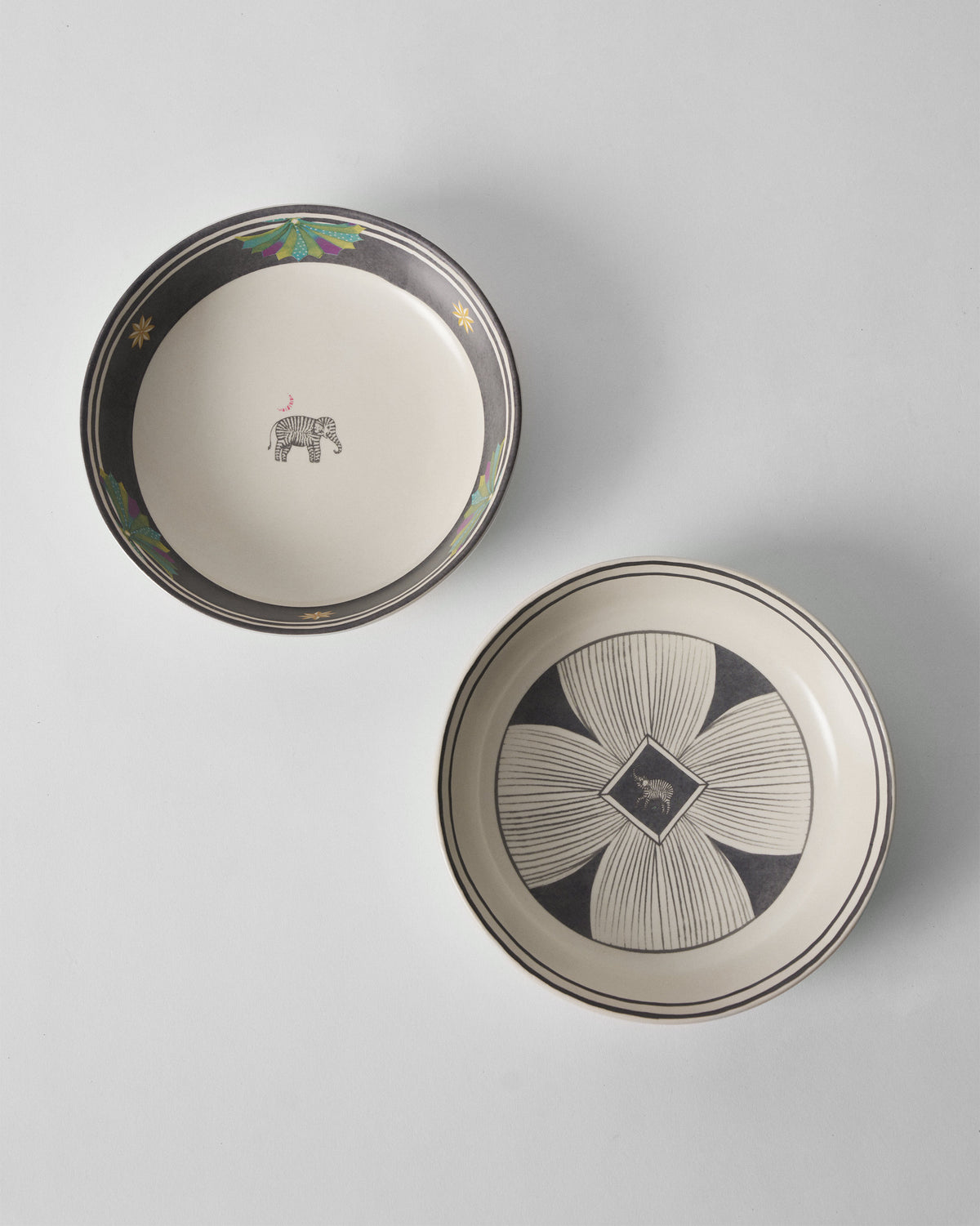 Palm Bloom shallow bowls with elephant and charcoal flower centres.
