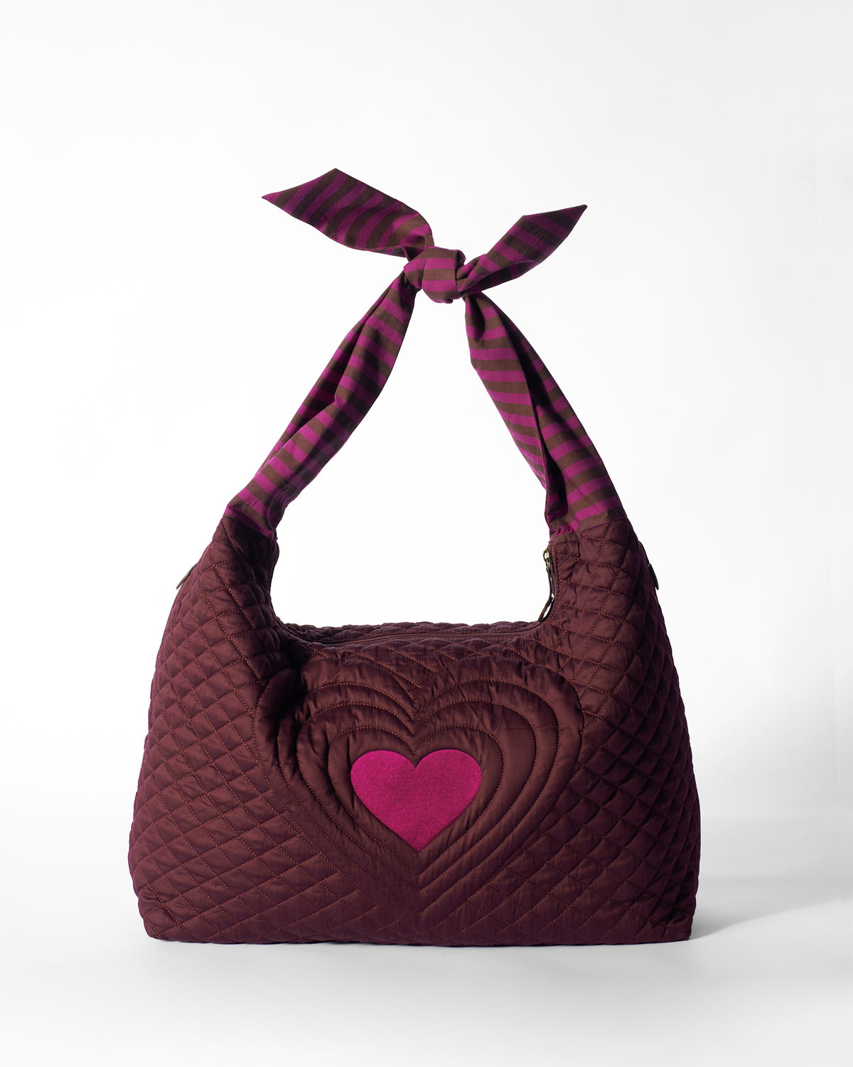 Mulberry Farah Bag with a pink heart and striped tie handle.
