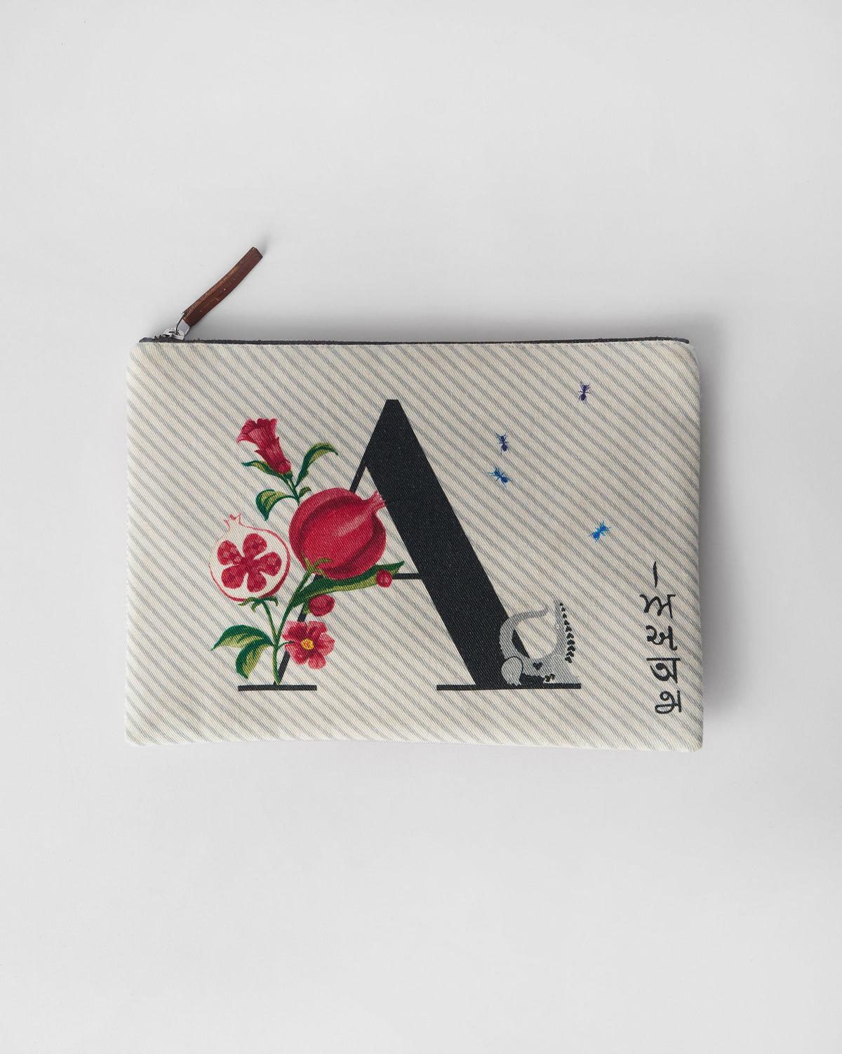 Ivory Anaar Pouch with a letter A and red pomegranate illustration.